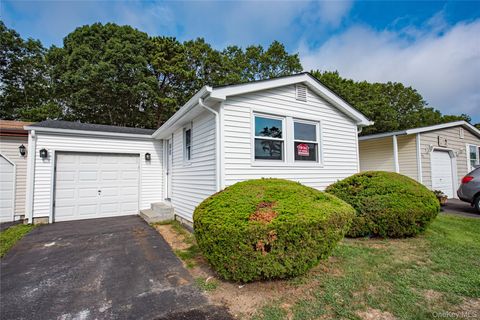 Photo of 145 Village Circle West Cir, Manorville, NY 11949 (MLS # 900845)
