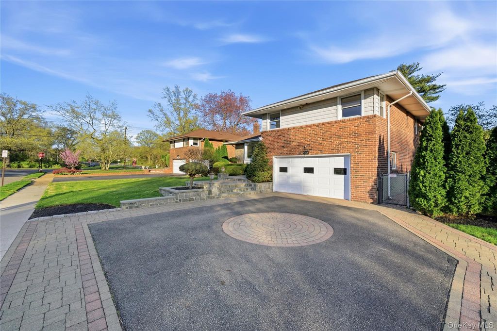 Photo of 49 Canterbury Road, Woodbury, NY 11797 (MLS # 966567)