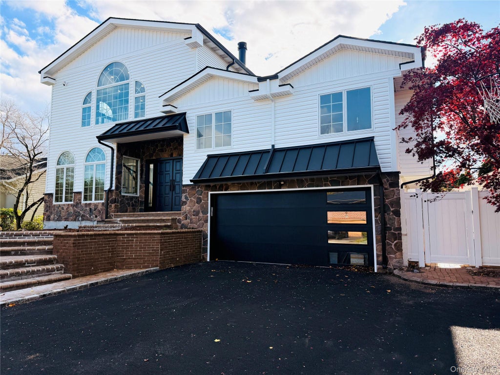 Photo of 65 Mellow Ln Ln, Jericho, NY 11753 (MLS # 1057483)
