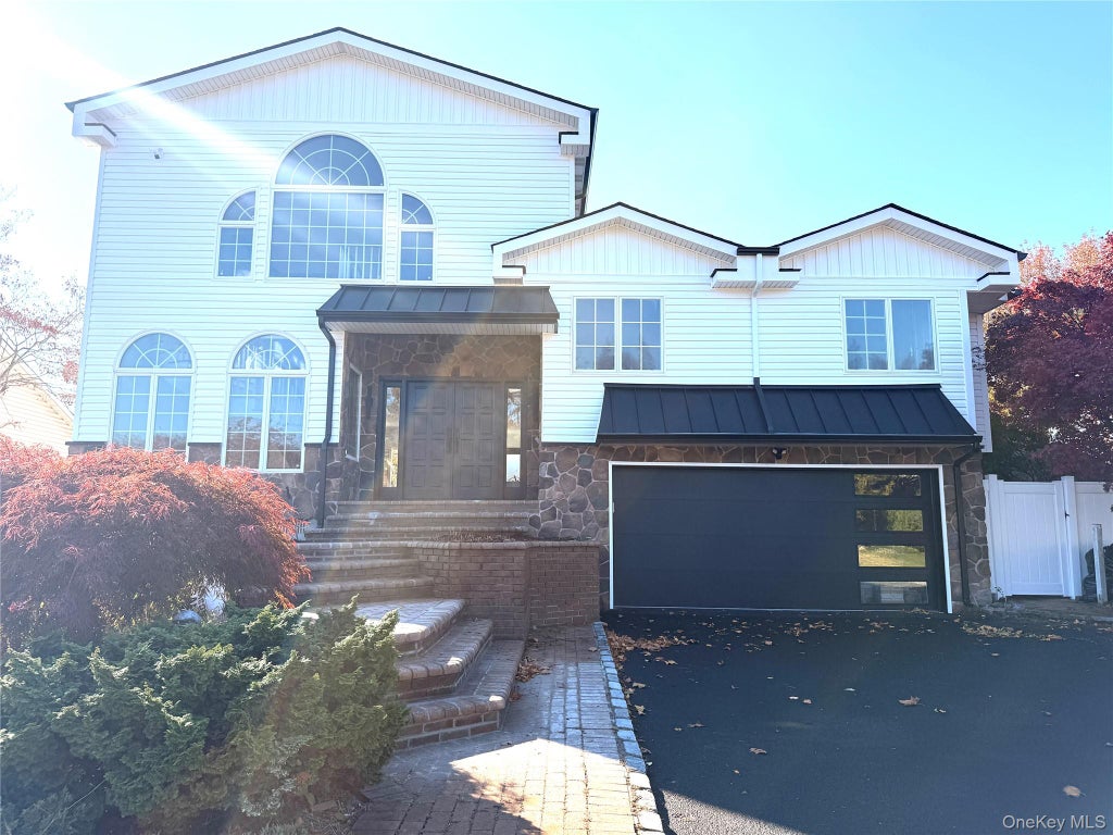 Photo of 65 Mellow Ln Ln, Jericho, NY 11753 (MLS # 1057483)