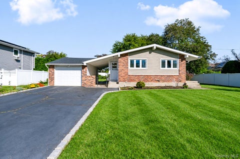 Photo of 9 Plowboy Path, Commack, NY 11725 (MLS # 1056718)
