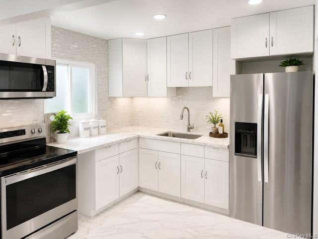 Photo of 28 S 28 Street, Wyandanch, NY 11798 (MLS # 1029293)