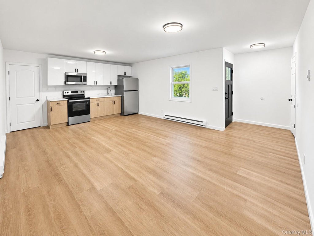 Photo of 220 Moriches Avenue, Mastic, NY 11950 (MLS # 1046823)