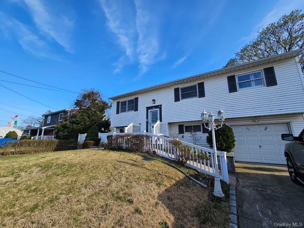 Photo of 106 Fountain Avenue, Selden, NY 11784 (MLS # 983587)