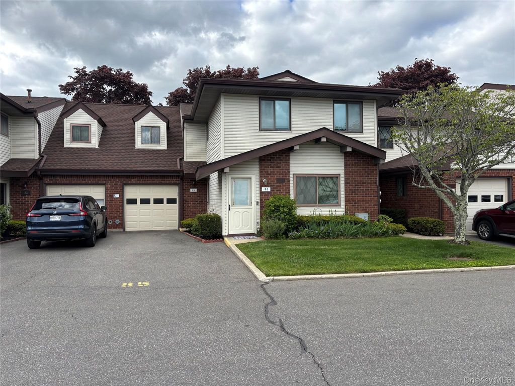 Photo of 86 W Cambridge Drive W #86, Copiague, NY 11726 (MLS # 1000936)