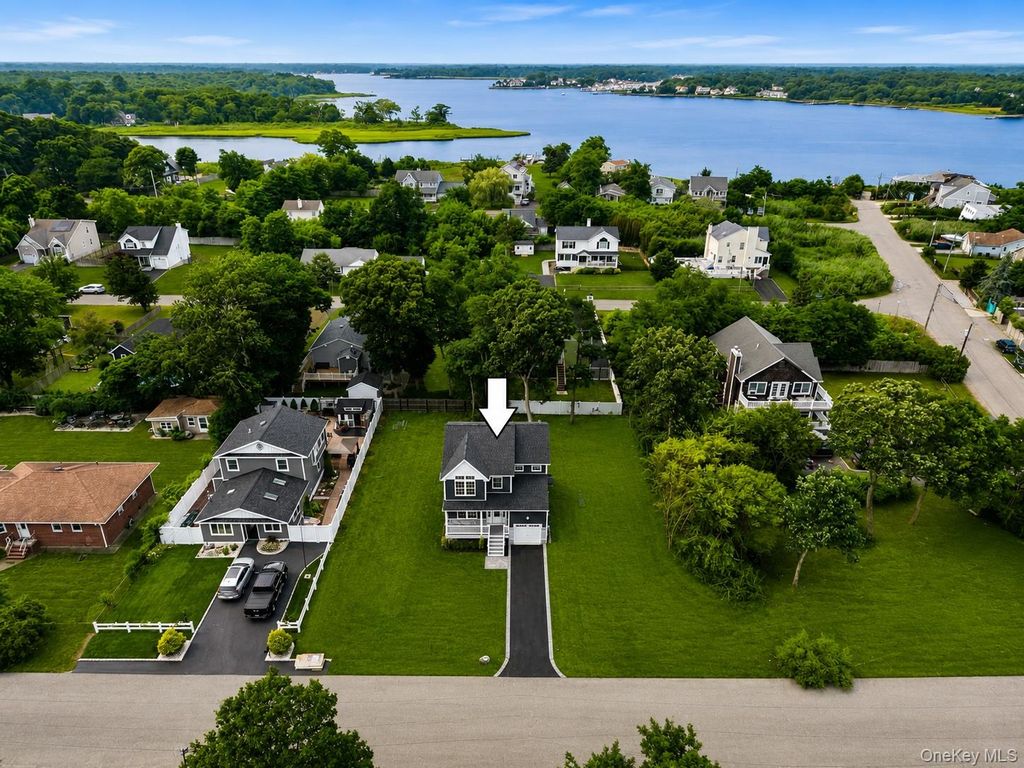 Photo of 7 Edgewater Drive, Mastic Beach, NY 11951 (MLS # 1027292)
