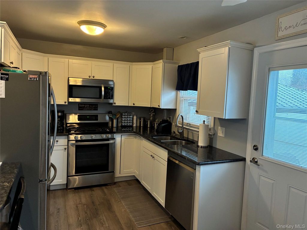 Photo of 34 Beach Street, West Islip, NY 11795 (MLS # 953020)