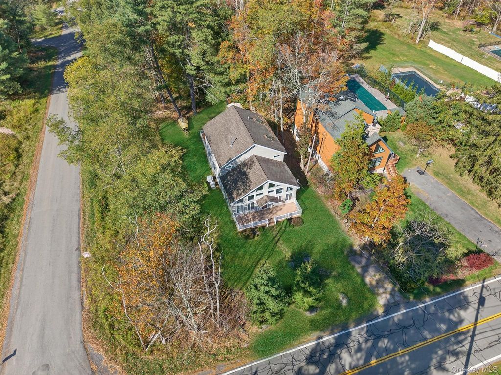 Photo of 518 Sackett Lake Road, Monticello, NY 12701 (MLS # 983945)