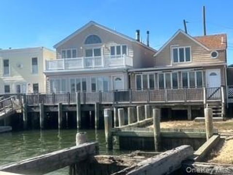 Photo of 12&14 W 5th Road, Broad Channel, NY 11693 (MLS # 927398) Photo of 12&14 W 5th Road, Broad Channel, NY 11693 (MLS # 927398)