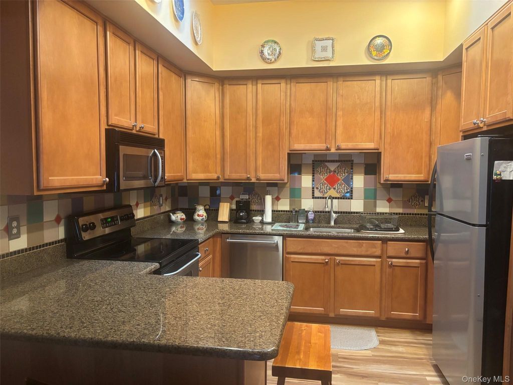 Photo of 1204 Aerie Way #1204, East Quogue, NY 11942 (MLS # 1029482)