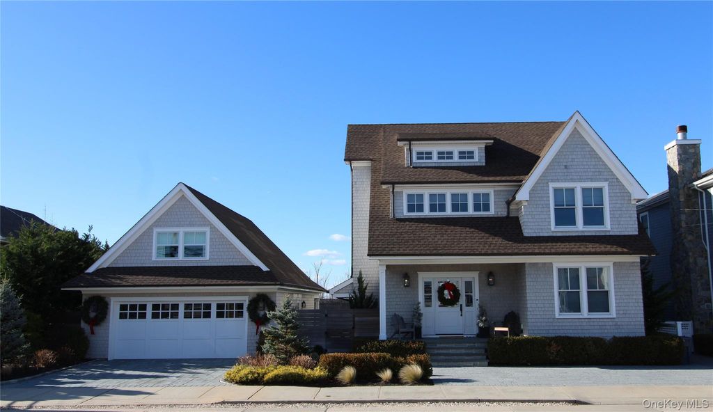 Photo of 99 Parkside Drive, Point Lookout, NY 11569 (MLS # 944469)