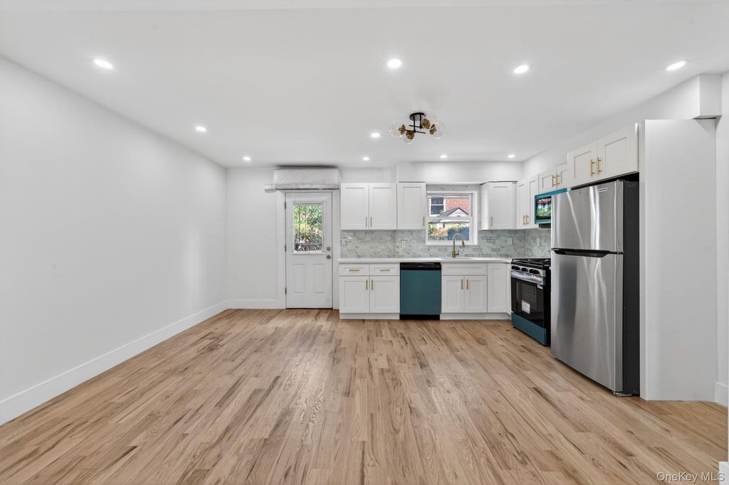 Photo of 1061 E 218th Street, Bronx, NY 10469 (MLS # 1028848)