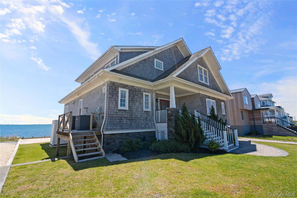 Photo of 21 Shinnecock Road, East Quogue, NY 11942 (MLS # 1012474)