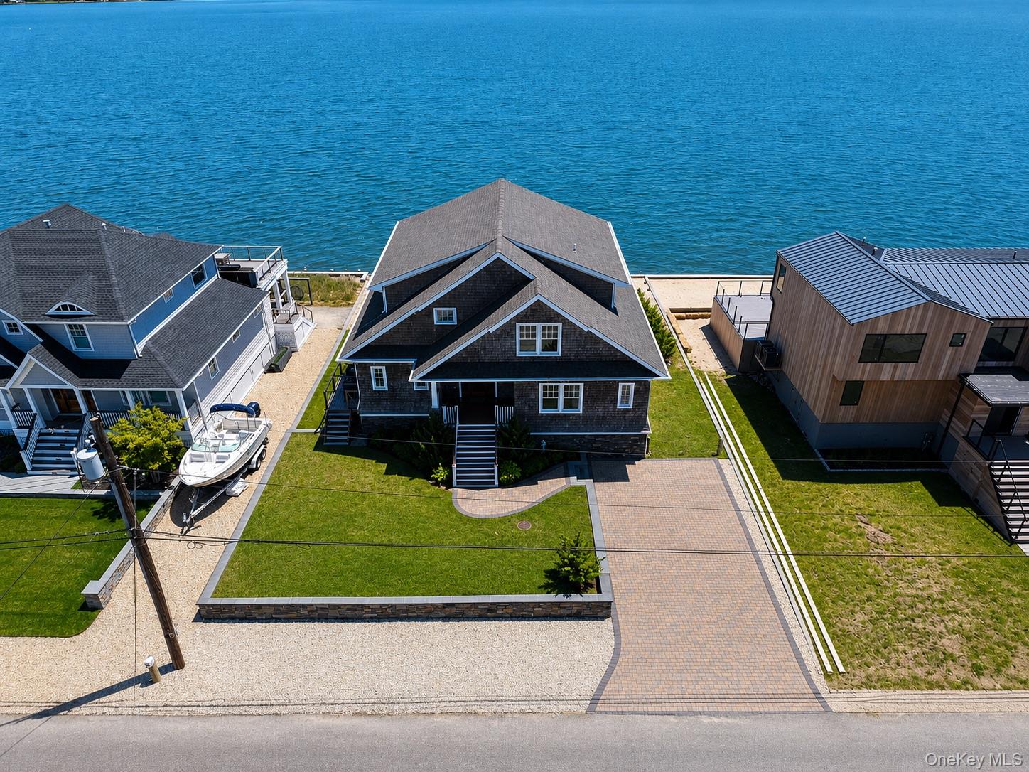 Photo 1 of 39 — 21 Shinnecock Road, East Quogue, NY 11942