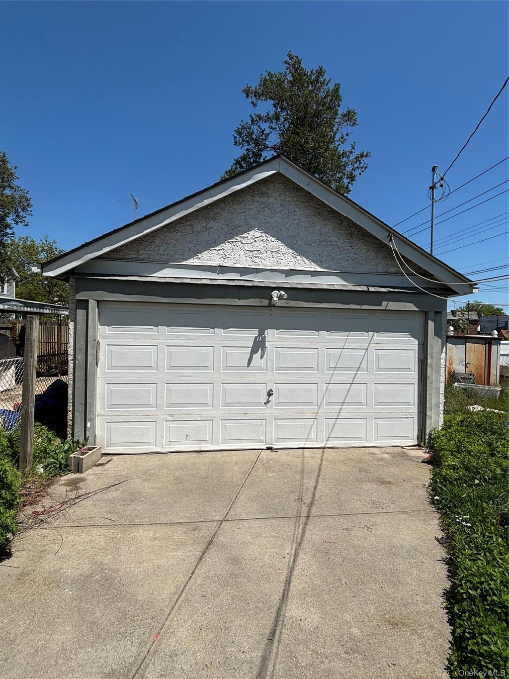 Photo of 11343 202ND Street, Saint Albans, NY 11412 (MLS # 1045479)