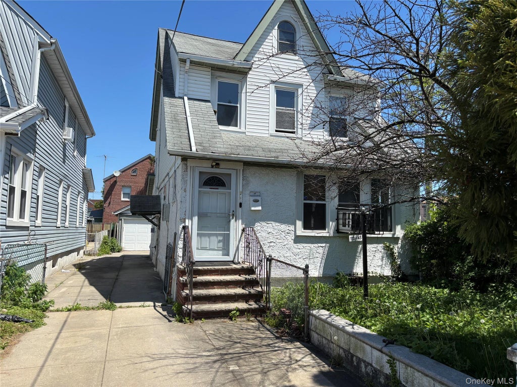 Photo of 11343 202ND Street, Saint Albans, NY 11412 (MLS # 1045479)