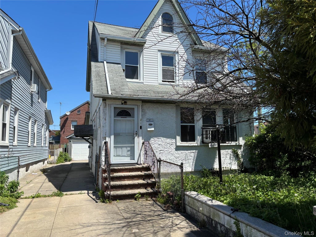Photo of 11343 202ND Street, Saint Albans, NY 11412 (MLS # 1045479)