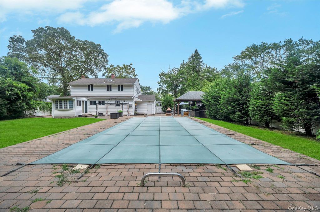 Photo of 8 Brenner Road, Coram, NY 11727 (MLS # 946153)