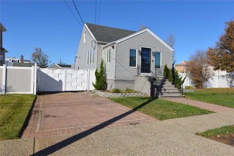 Photo of 588 Miller Avenue, Freeport, NY 11520 (MLS # 1065291)