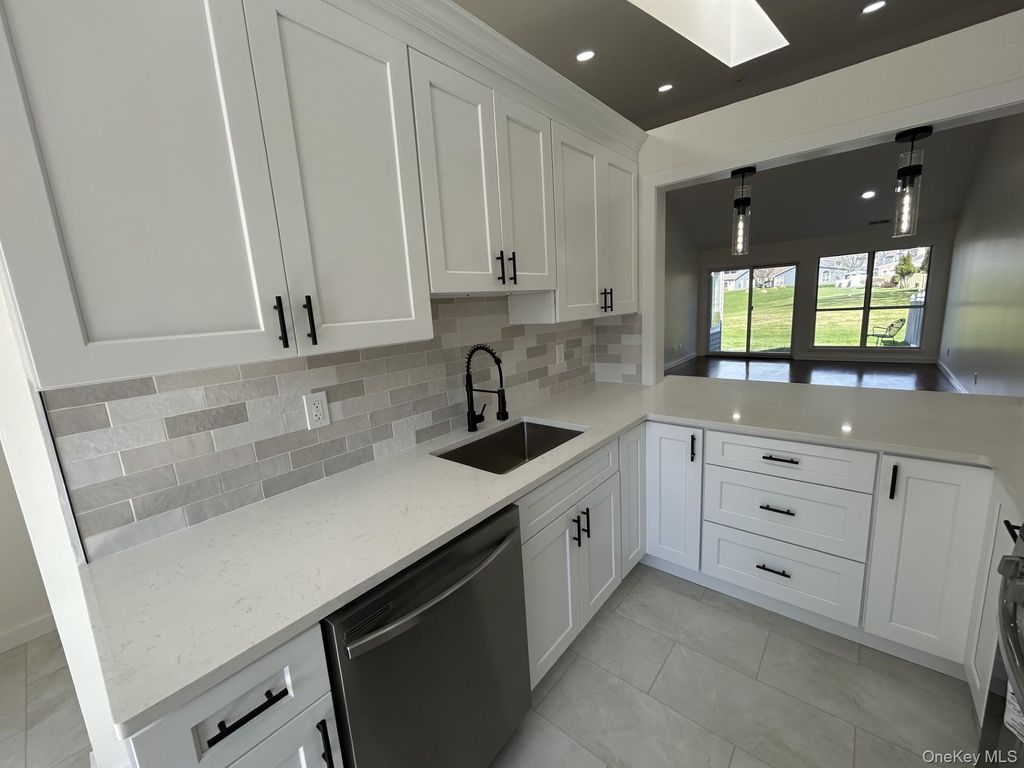 Photo of 844 Birchwood Park Drive, Middle Island, NY 11953 (MLS # 986346)