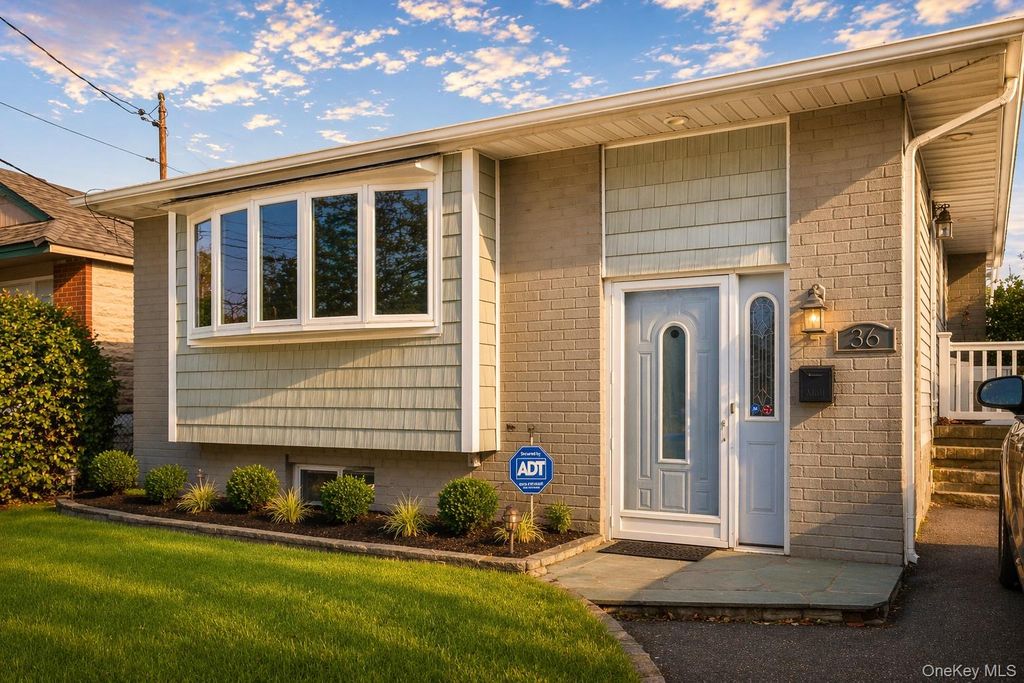 Photo of 36 Elton Street, Westbury, NY 11590 (MLS # 986190)