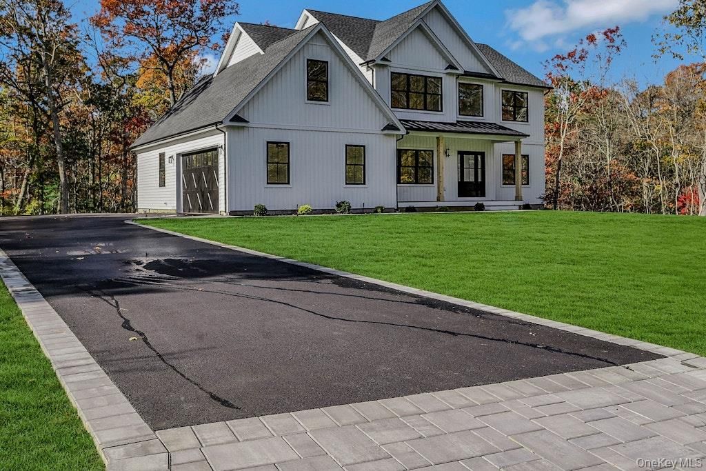 Photo of 20 Bunker Lane, Middle Island, NY 11953 (MLS # 996124)