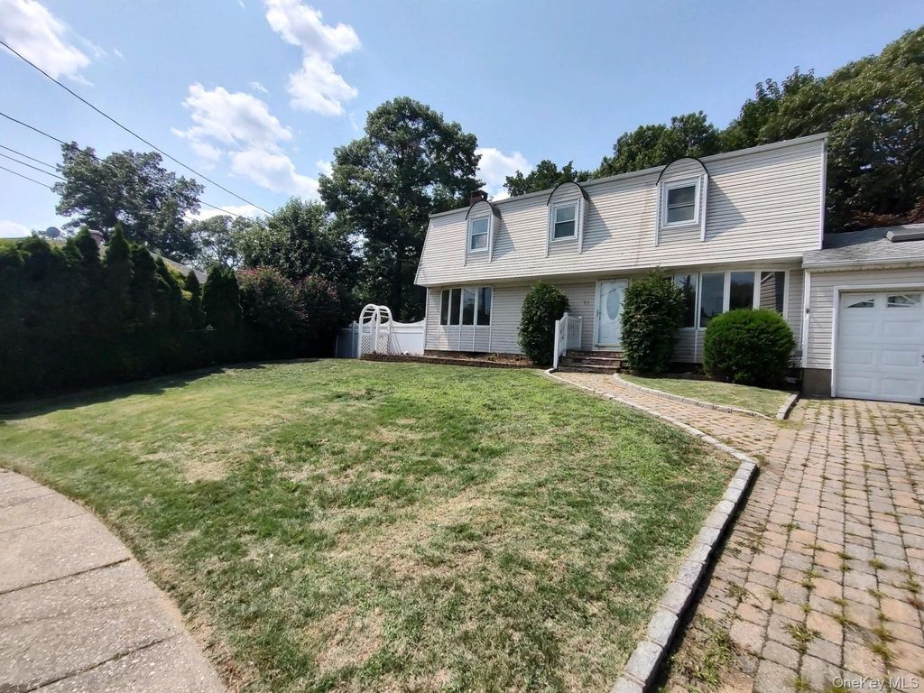 Photo of 11 Hollo Drive, Holbrook, NY 11741 (MLS # 985473)