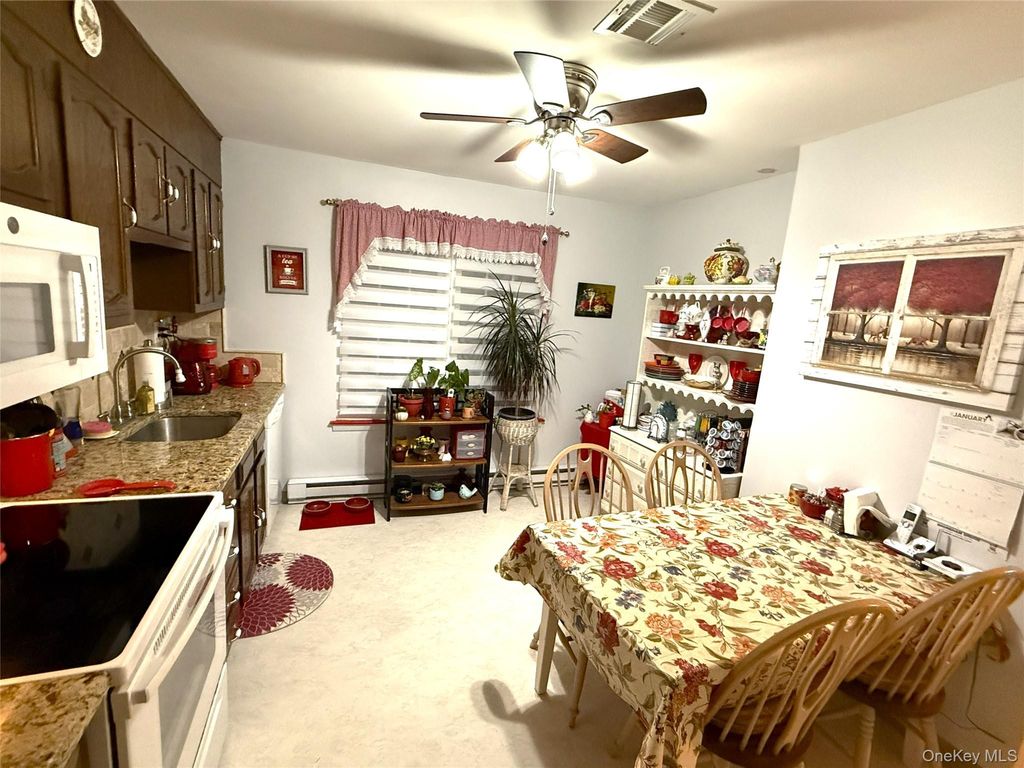 Photo of 418 Weymouth Court #C, Ridge, NY 11961 (MLS # 960927)