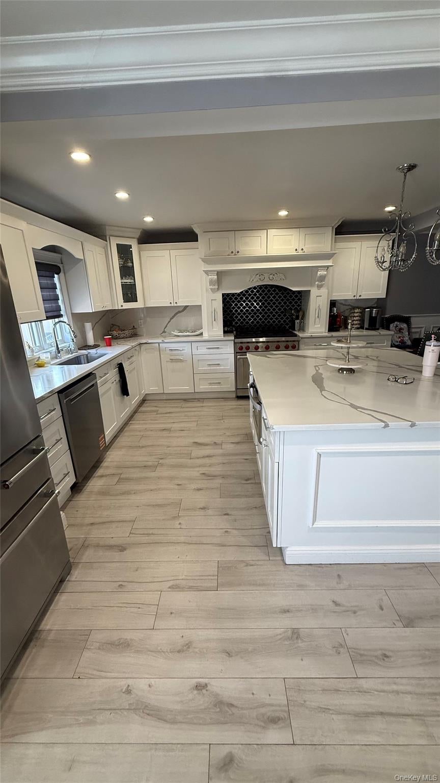 Photo of 16027 83rd Street, Howard Beach, NY 11414 (MLS # 1049478)