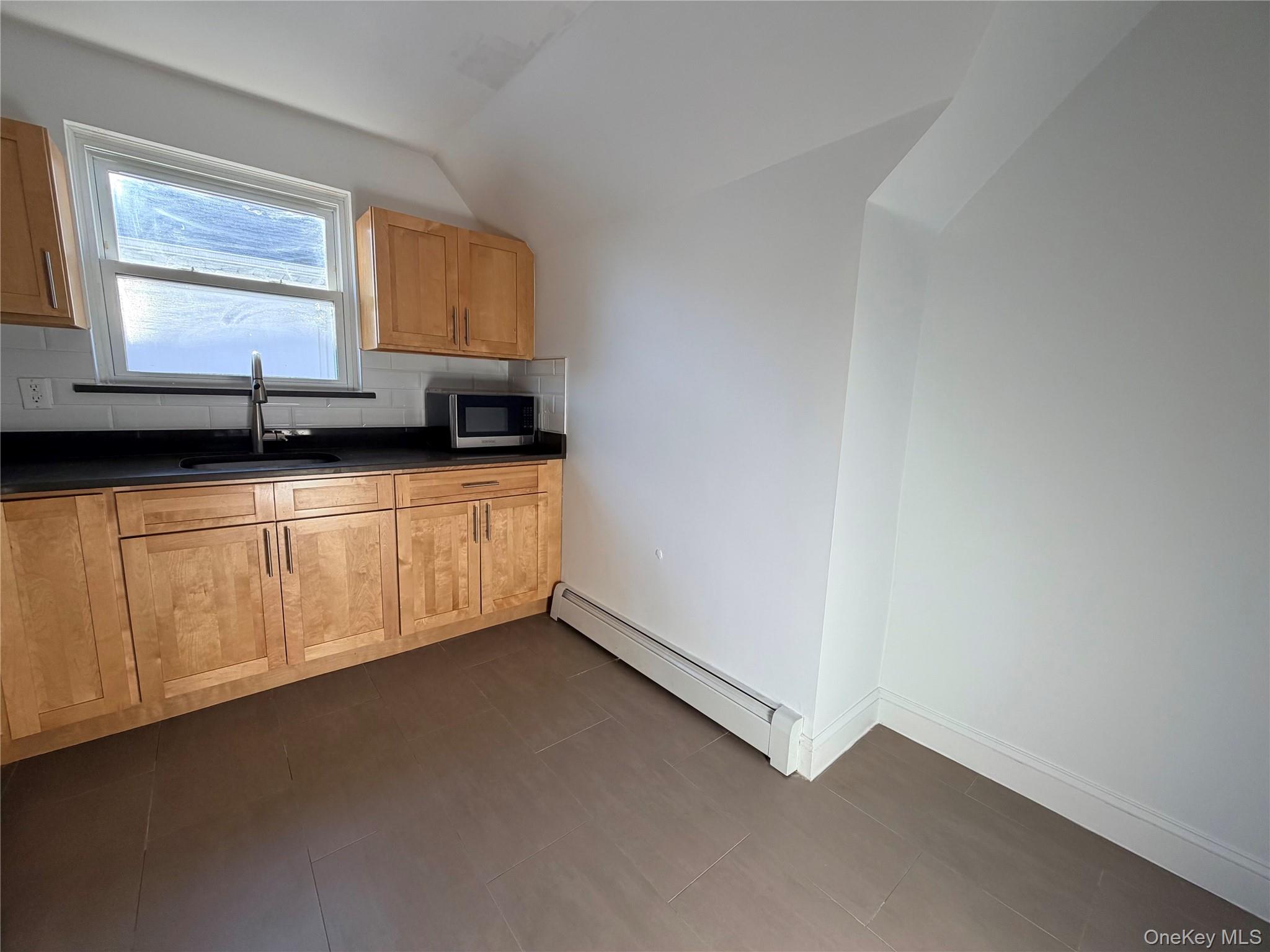 210-10 56th Avenue 2nd Fl