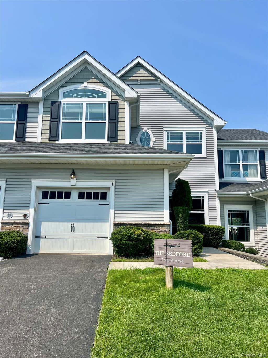 Photo of 11 Willow Terrace #11, Coram, NY 11727 (MLS # 1038184)