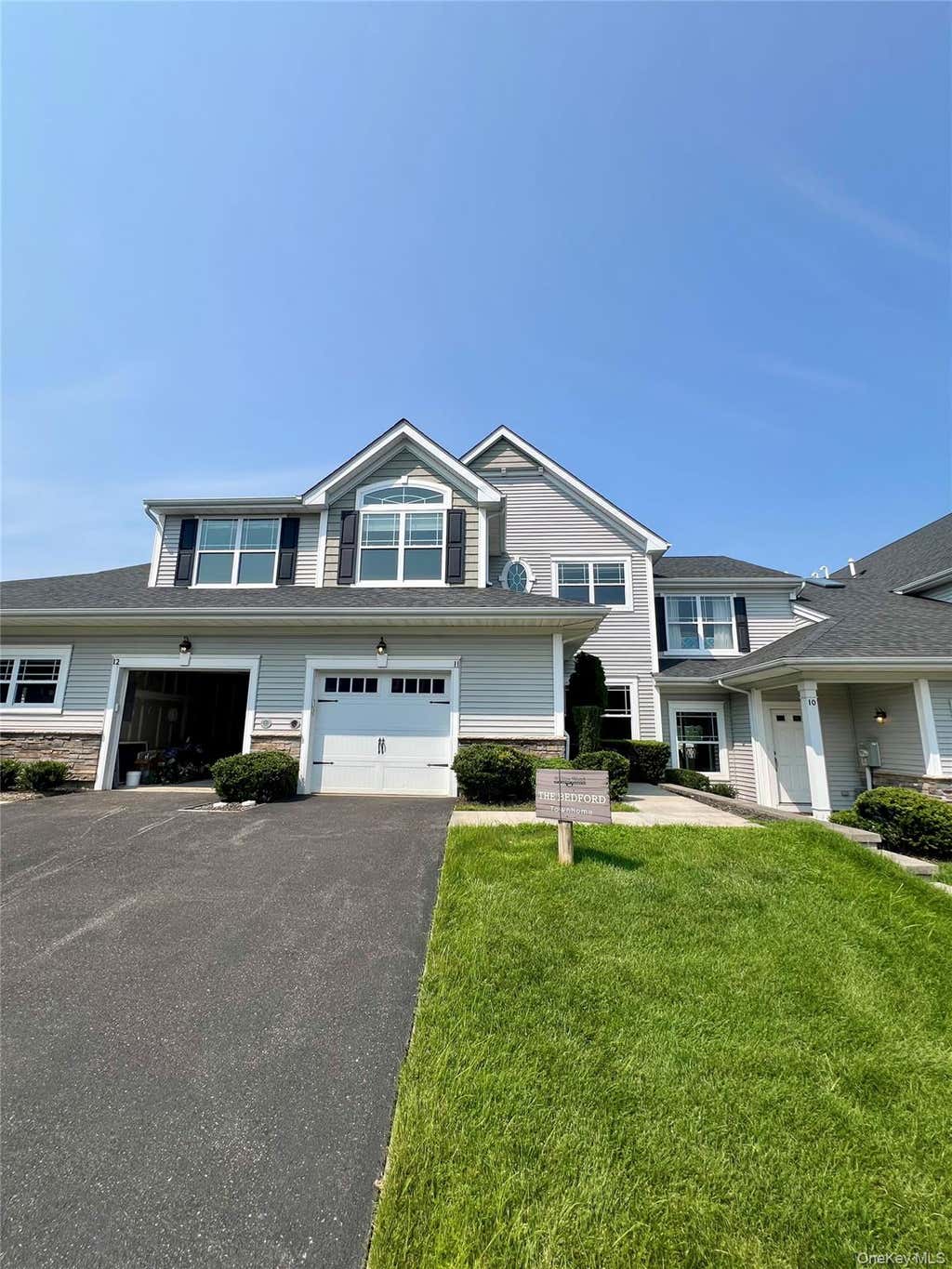 Photo of 11 Willow Terrace #11, Coram, NY 11727 (MLS # 1038184)