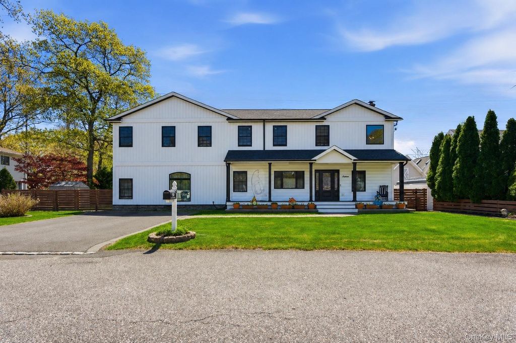 Photo of 18 Pond Road, Holbrook, NY 11741 (MLS # 992845)