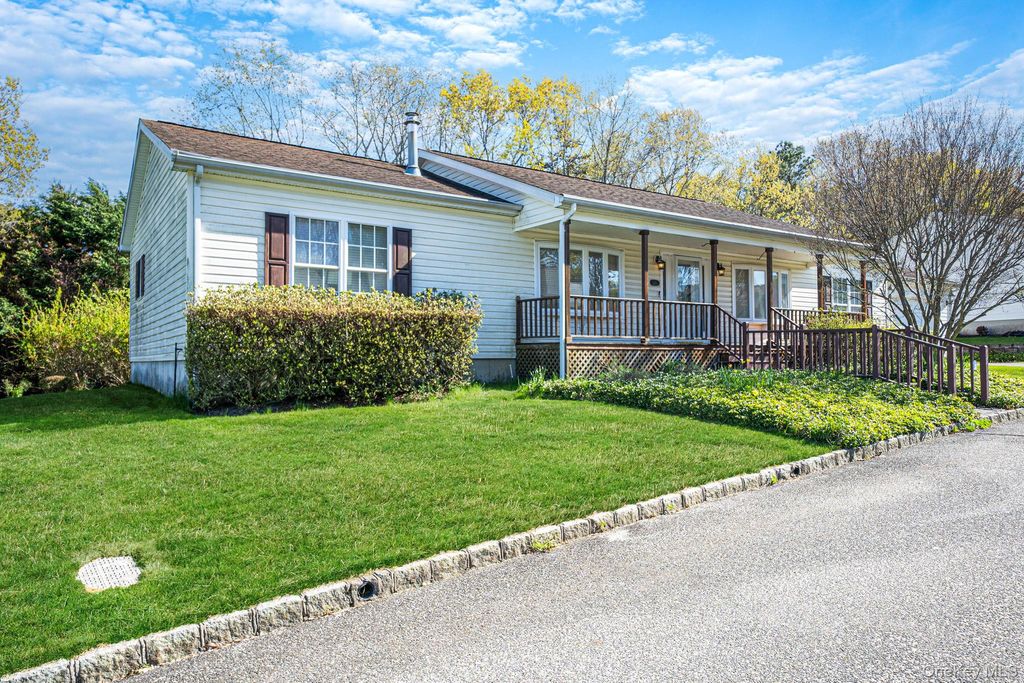 Photo of 1407 Middle Road RD #253, Calverton, NY 11933 (MLS # 994256)