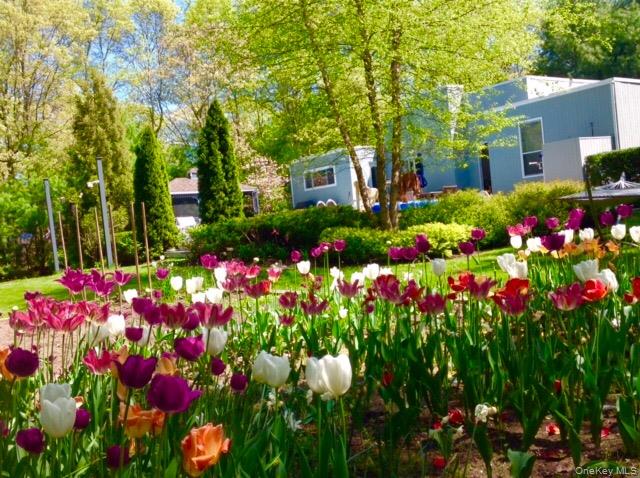 Photo of 10 Glenmore Road, Hampton Bays, NY 11946 (MLS # 1053693)