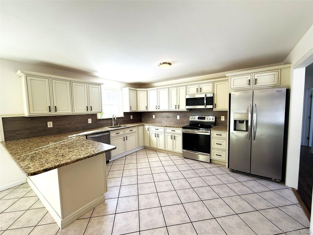 Photo of 2 New Street, Holtsville, NY 11742 (MLS # 961300)