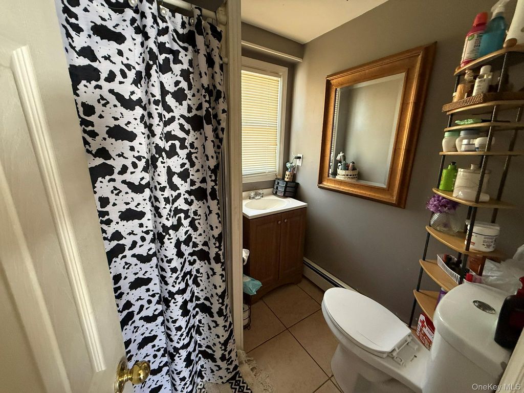 Photo of 8 Speed Street, Brentwood, NY 11717 (MLS # 957044)