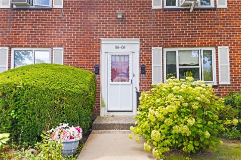 Photo of 86-06 231st St #Upper, Queens Village, NY 11427 (MLS # 898140)