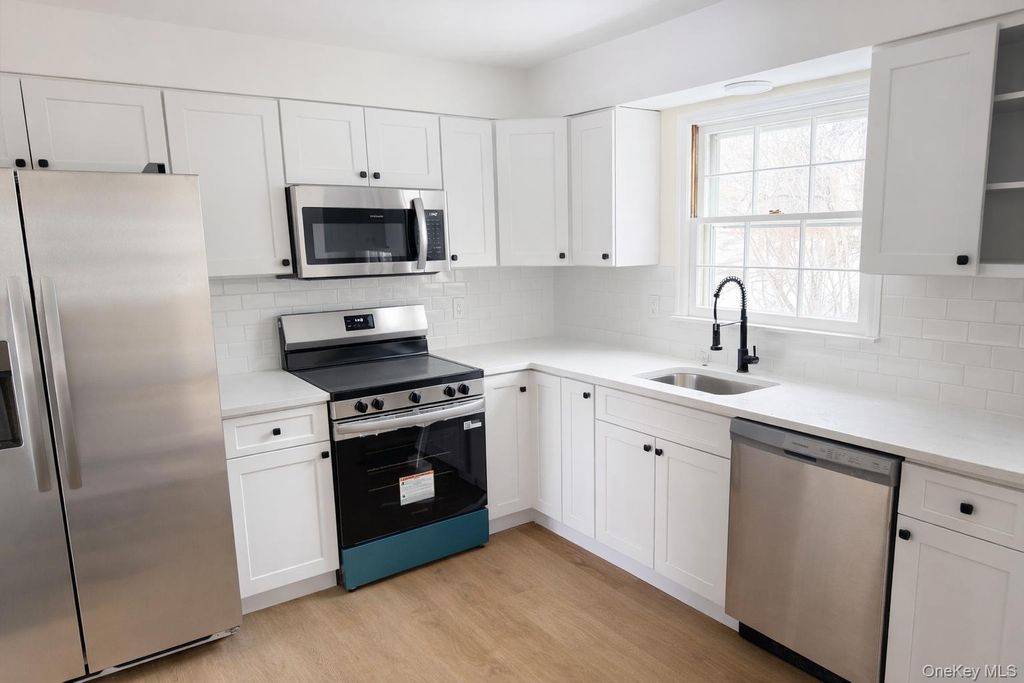 Photo of 307 Norwalk Avenue, Medford, NY 11763 (MLS # 967541)