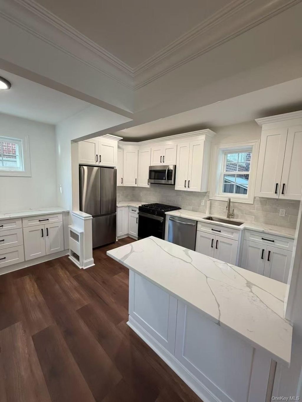 Photo of 36-40 167th Street, Flushing, NY 11358 (MLS # 944636)