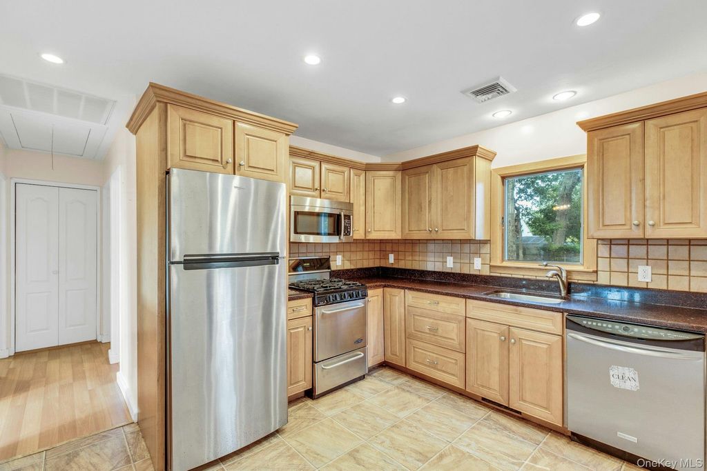 Photo of 130 Sylvan Avenue, Flanders, NY 11901 (MLS # 922216)