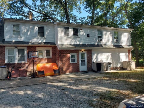 Photo of 10 Sally Lane, Ridge, NY 11961 (MLS # 1029889)