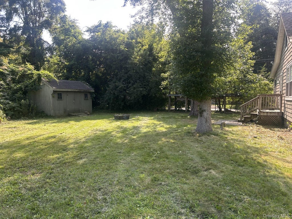 Photo of 23 Whittier Drive, Mastic Beach, NY 11951 (MLS # 1061031)