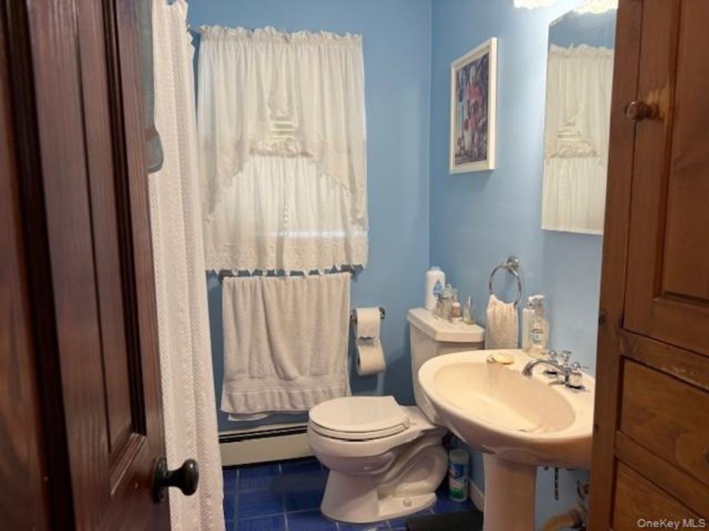 Photo of 71 Carroll Street, Brentwood, NY 11717 (MLS # 941850)