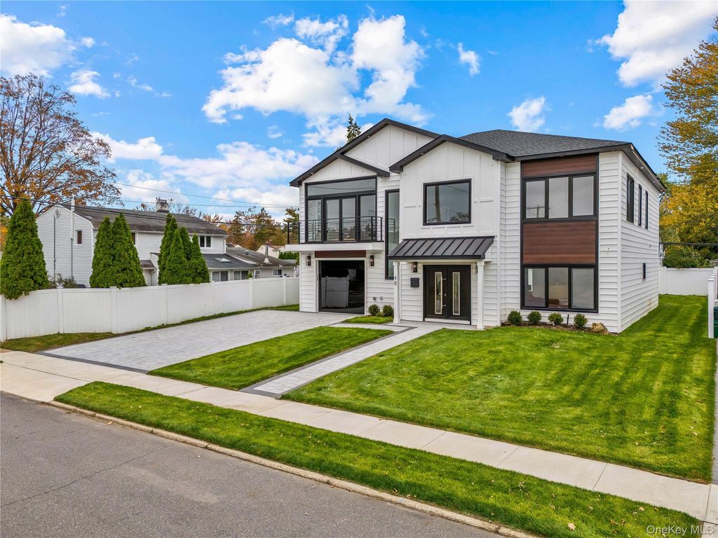 Photo of 48 Martin Lane, Westbury, NY 11590 (MLS # 974270)