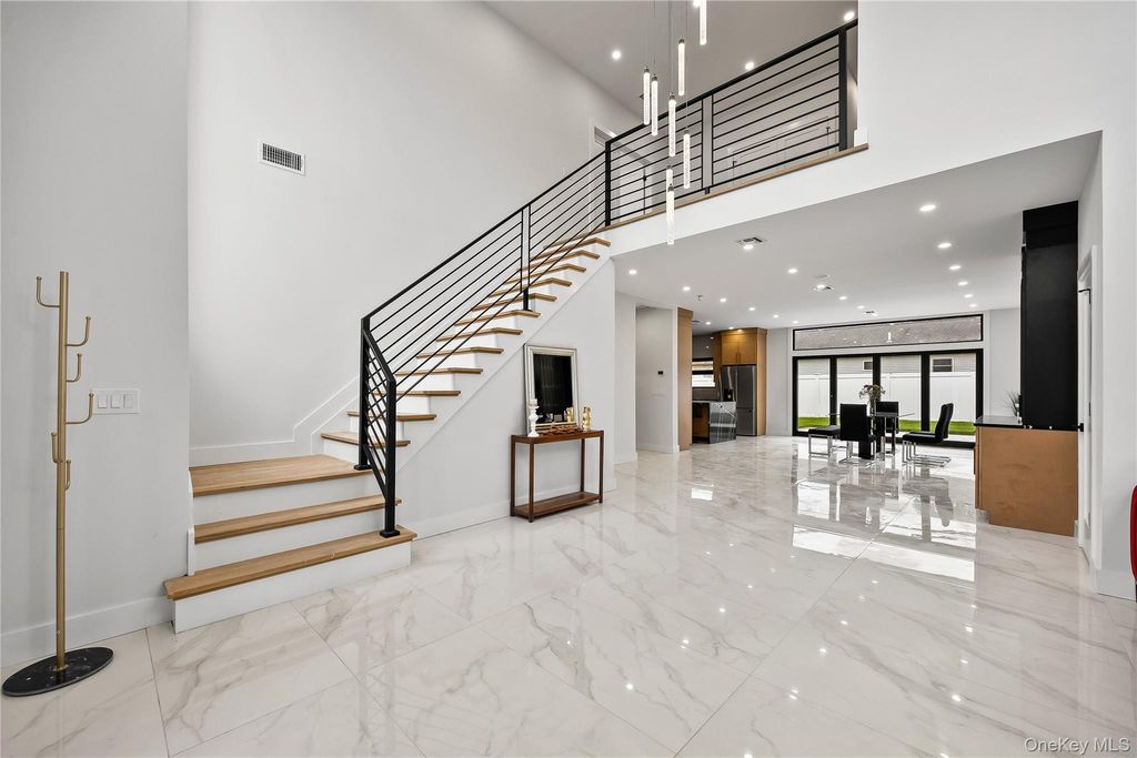 Photo of 48 Martin Lane, Westbury, NY 11590 (MLS # 974270)