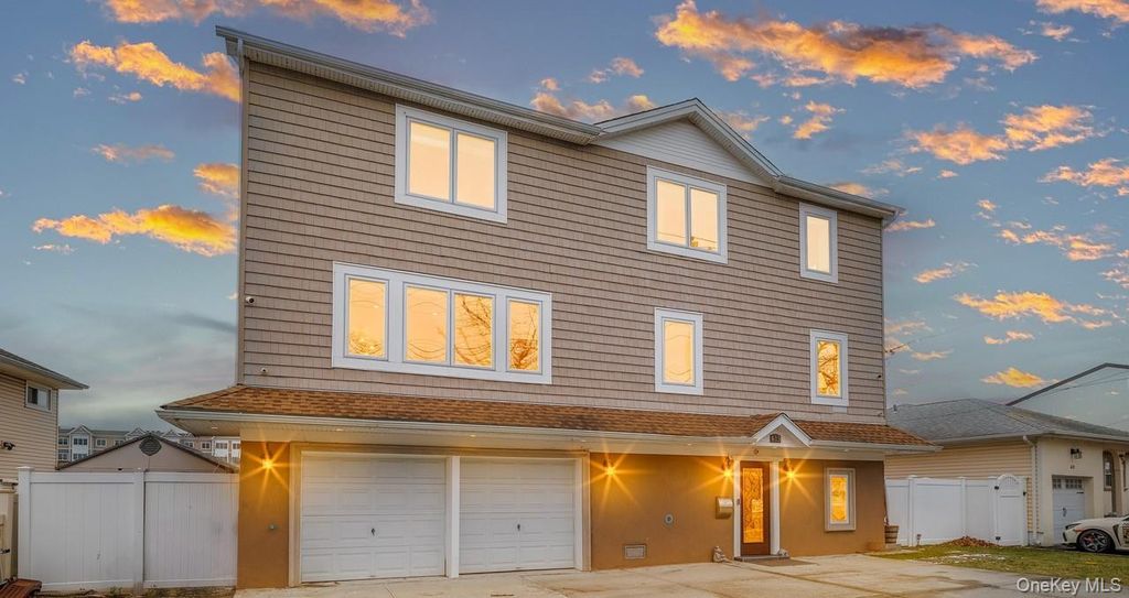 Photo of 615 Pearl Street, Oceanside, NY 11572 (MLS # 986110)