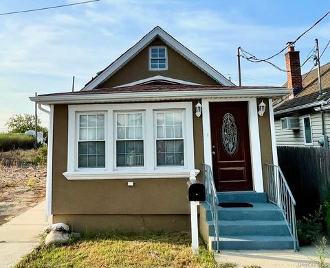 Homes For Sale - 10203 Rau Court<br/> Howard Beach, NY 11414