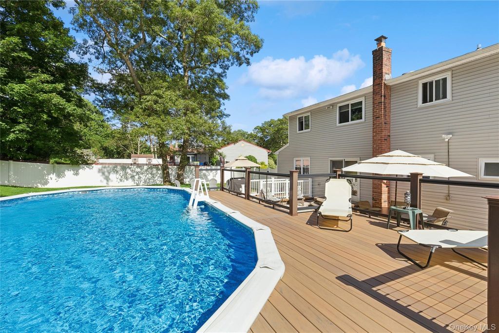 Photo of 23 Foxboro Avenue, Farmingville, NY 11738 (MLS # 952847)