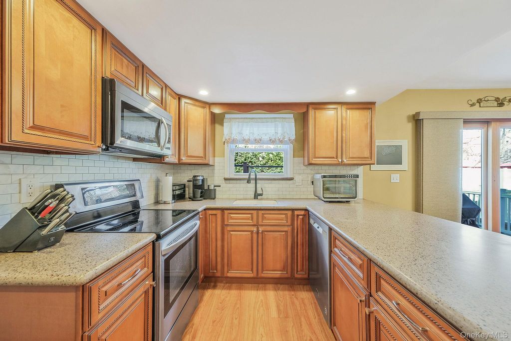 Photo of 23 Foxboro Avenue, Farmingville, NY 11738 (MLS # 952847)